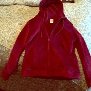 Maroon zip-up sweatshirt. Size Medium (8-10).